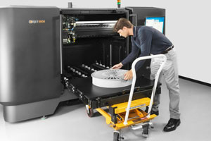 The Objet1000 includes a handcart for unloading large models.