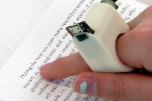 MIT's FingerReader uses 3D printing and digital video technology to assist blind users with reading. Courtesy of MIT Media Lab.