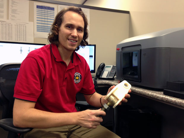 Jacob Skaggs with the Stratasys Mojo 3D printer he won as part of the Rapid Ready Tech Sweepstakes.