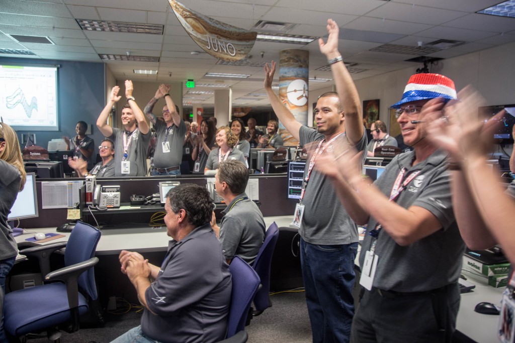 : Engineers at Lockheed Martin celebrate after monitoring NASA’s Juno spacecraft as it goes into orbit at Jupiter. Photo courtesy: Lockheed Martin
