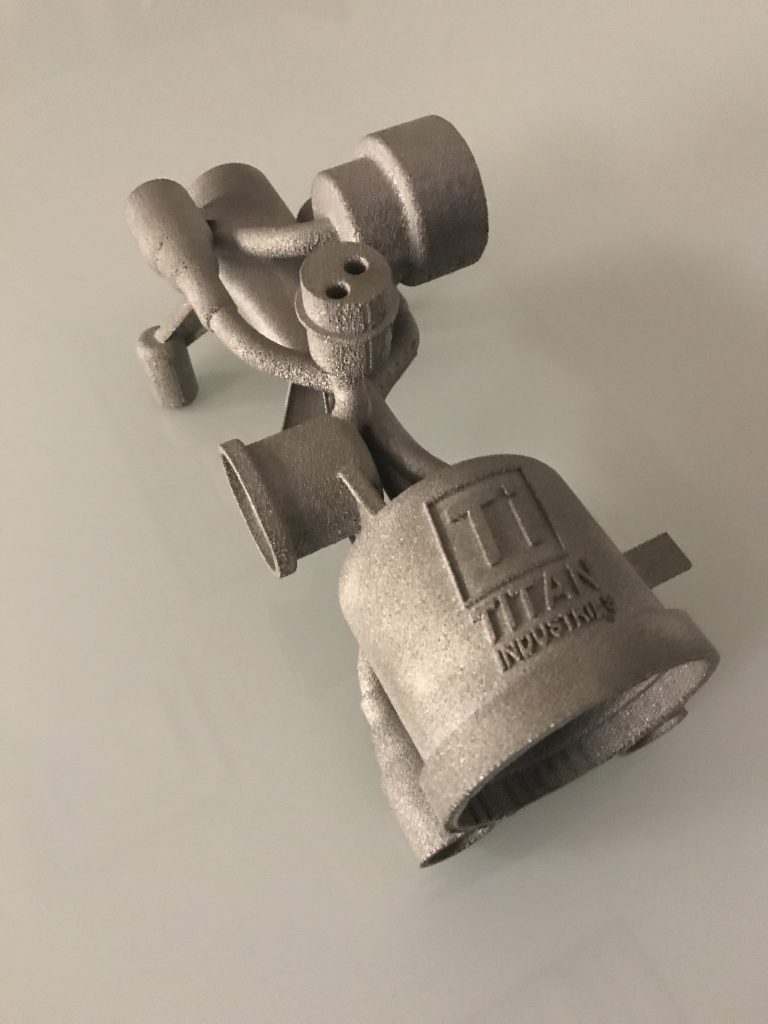 Titanium hydraulic manifold (7 inches by 3 inches by 3 inches) designed and 3D-printed on an Arcam system by Titan Industries. Surface finish is as-built. (Image courtesy Titan Industries)