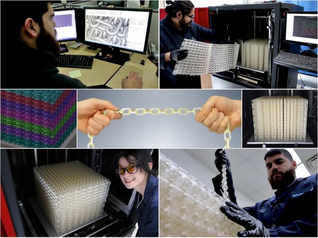 EnvisionTEC announced its E-RigidForm material by displaying a 328-ft. chain that was 3D printed in the new material. Designed by EnvisionTEC 3D Builder Robert Montes (upper left and lower right), the chain features 6,144 links, each measuring 1.5 in. The print job was processed with support from colleagues Erica Finkowski (lower left), Josue Nunes (upper right) and Jason Spurlock (not shown). Images courtesy of EnvisionTEC.
