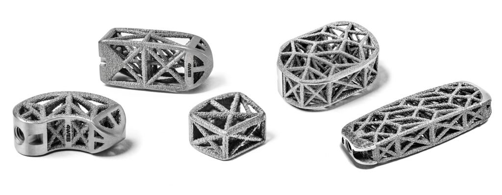 3D printed titanium spinal implants from 4WEB Medical, showing the truss-and-strut-based open architecture that promotes bone in-growth while supporting optimal load bearing. (Image courtesy 4WEB Medical)