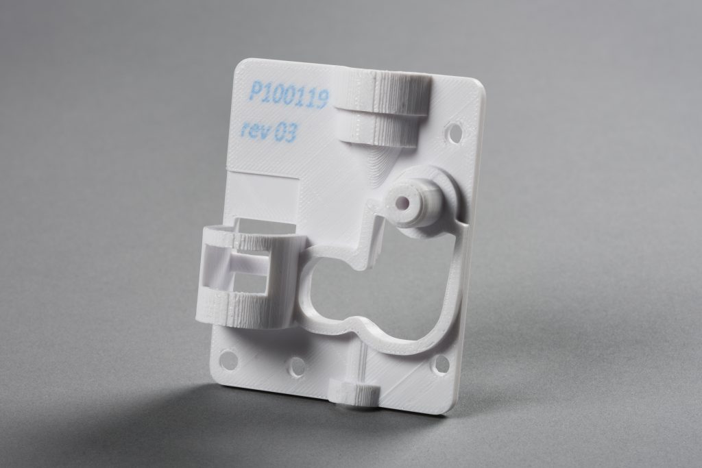 RIZE fixturing part, including built-in labeling, 3D-printed on the RIZE office-safe printer. (Image courtesy RIZE)