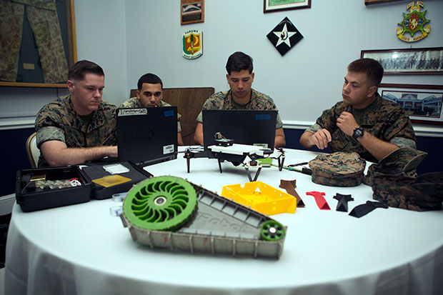 Marines assigned to the 2nd Battalion, 8th Marine Regiment, 2nd Marine Division, plot coordinates to fly a 3D printed unmanned aircraft system at Camp Lejeune, NC. Marine Corps photo by Cpl. John A. Hamilton Jr.