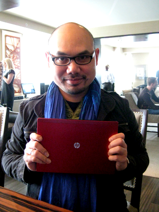 DE contributing editor Kenneth Wong poses with a Sonoma red HP Mini.