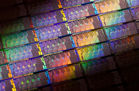 20110308XeonE3SandyBridge Intel Xeon E3-1200, which features general processor and graphics processor units on the same die, is based on Sandy Bridge technology Intel announced in January at CES. (Close up here shows Sandy Bridge wafter.)