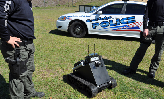 PDBot, a SWAT robot designed and built by FIRST Robotic Competition students from The Pink Team for their local police department.