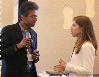Annalise Suzuki (right), Director of Technology and Engagement for Elysium, speaking with presenter Ram Pentakota of Adient, at Elysium’s first global summit on Model-Based Definition and validation.