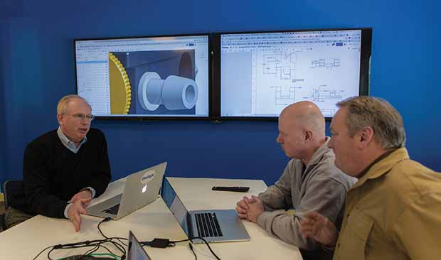 Left to right: Onshape CEO Jon Hirschtick discusses the software with engineers Bob Miner and Steve Hess.