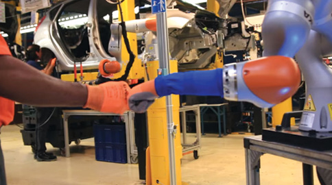 The new generation of collaborative robots augment human activity instead of replacing it. Image: Ford