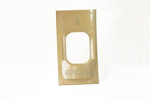 This aircraft interior window panel was 3D-printed using Certified ULTEM 9085 resin on a new edition of the Fortus 900mc Production 3D Printer, Stratasys' largest-capacity FDM (fused deposition modeling) additive manufacturing system. Image courtesy of Stratasys Ltd.