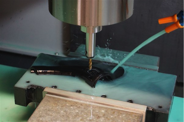Shown above is an enclosure section of a plastic prototype belonging to a medical device. It is being machined by Datum3D in a DMC DM 52VL CNC Vertical Mill, which has 4 axes of motion and can cut parts up to 42-inches in size with extreme precision. The high-tolerance test part is designed and CNC programmed by Datum3D in SolidWorks. The 3D manufacturing data is then downloaded to their networked CNC machines to initiate the cutting process. Engineers can monitor all machines remotely to check their progress, via a mobile device if need be.