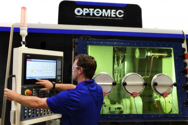 The LENS 860 Hybrid Controlled Atmosphere System from Optomec, with a larger work envelope and higher powered lasers, provides more capabilities for metal hybrid additive manufacturing. Image courtesy of Optomec.