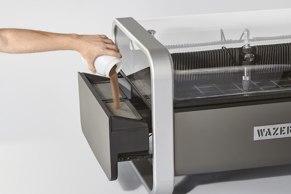 WAZER has been designed with simplicity in mind, including an easy way to load fresh abrasion materials. Image Courtesy of WAZER